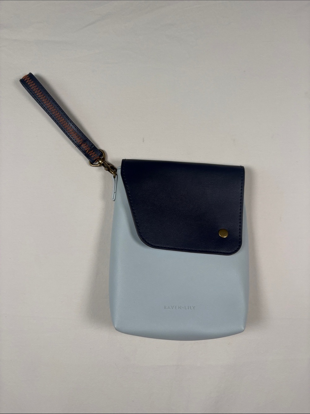 Raven + Lily Light Blue Body with Navy Flap Wristlet